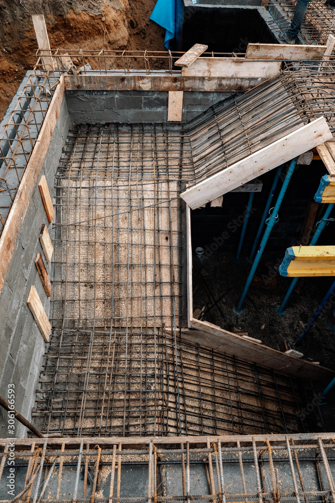 Obraz premium Turning ceiling reinforcement at the construction site