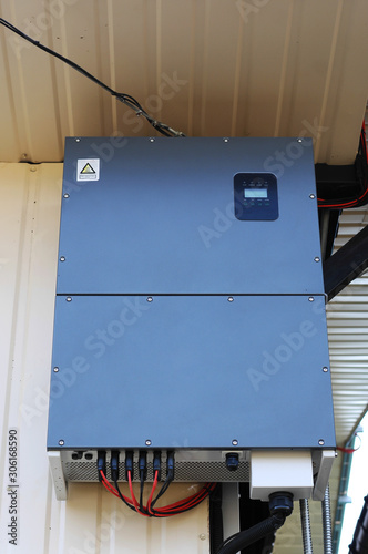 Solar inverter  on the side of a house
