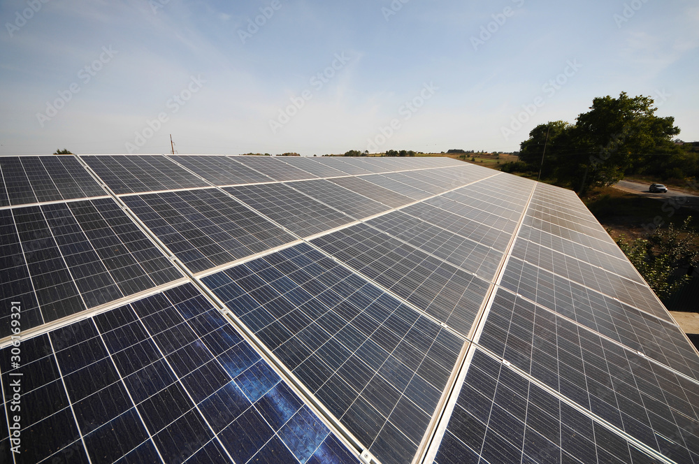 solar panels with sunny sky. Blue solar panels. background of photovoltaic modules for renewable energy. solar panels with sunny sky. Blue solar panels. background of photovoltaic modules for renewable energy.