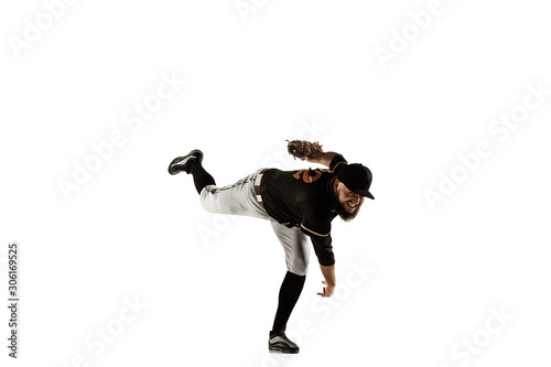Photography Baseball player, pitcher in a black uniform practicing and training isolated on a white background