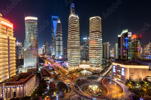 illuminated Lujiazui skyline and Ring road circular footbridge, Shanghai, China