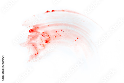 A stain of strawberry jam or fold. On a white isolated background. Abstraction