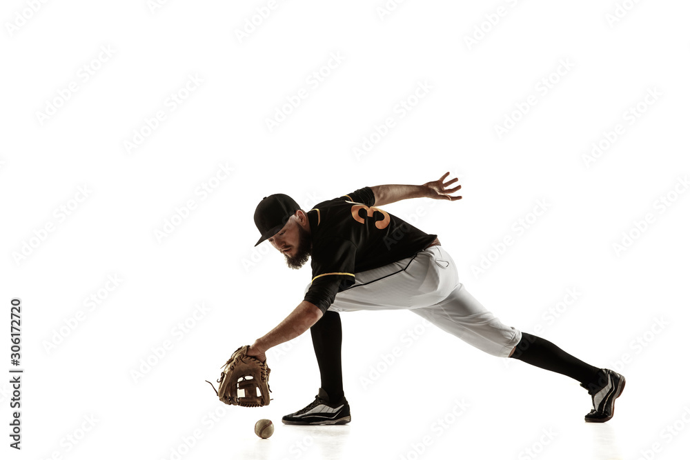 Baseball player, pitcher in a black uniform practicing and training isolated on a white background. Young professional sportsman in action and motion. Healthy lifestyle, sport, movement concept. Baseball player, pitcher in a black uniform practicing and training isolated on a white background. Young professional sportsman in action and motion. Healthy lifestyle, sport, movement concept.
