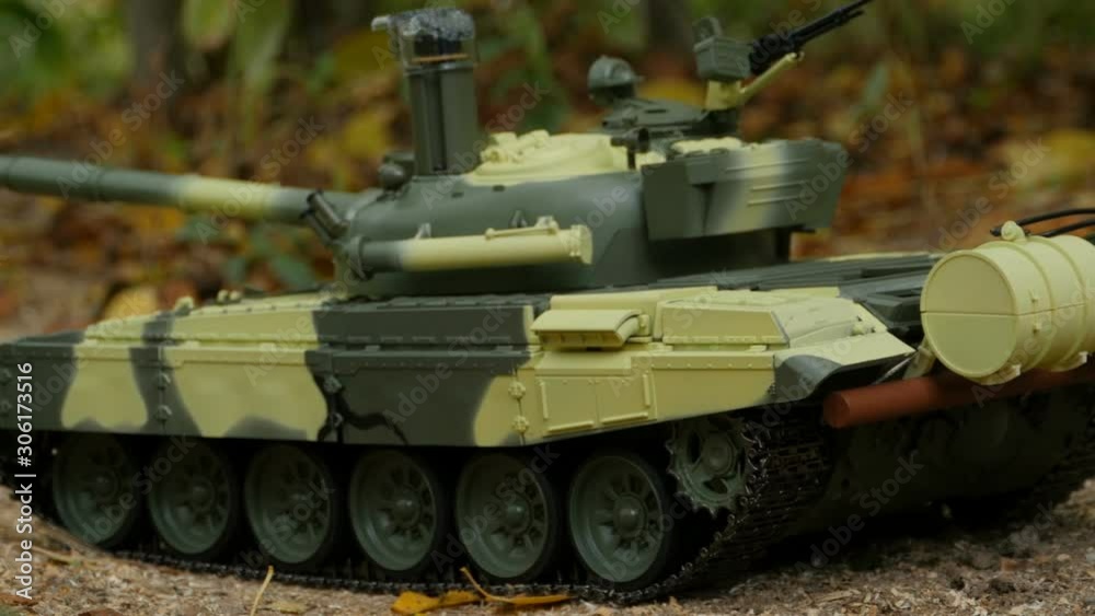 tank T-72 camouflage coloring side view , camera motion close to tank T-72 camouflage coloring side view , camera motion close to