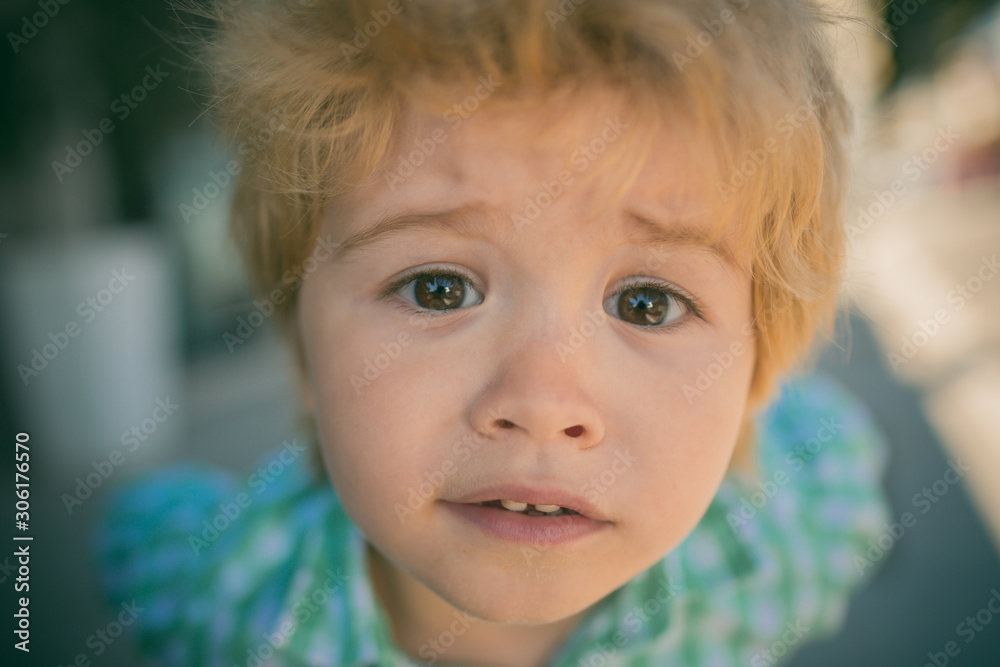 Sad eyes. Closeup portrait of a sad child. Childrens emotions. Emotional intelligence. Beautiful baby face. Sad eyes. Closeup portrait of a sad child. Childrens emotions. Emotional intelligence. Beautiful baby face.