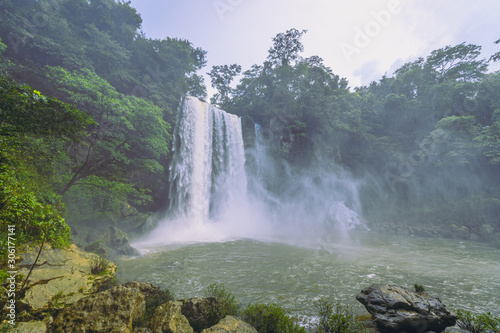 Landscape. A waterfall in the middle of the jungle