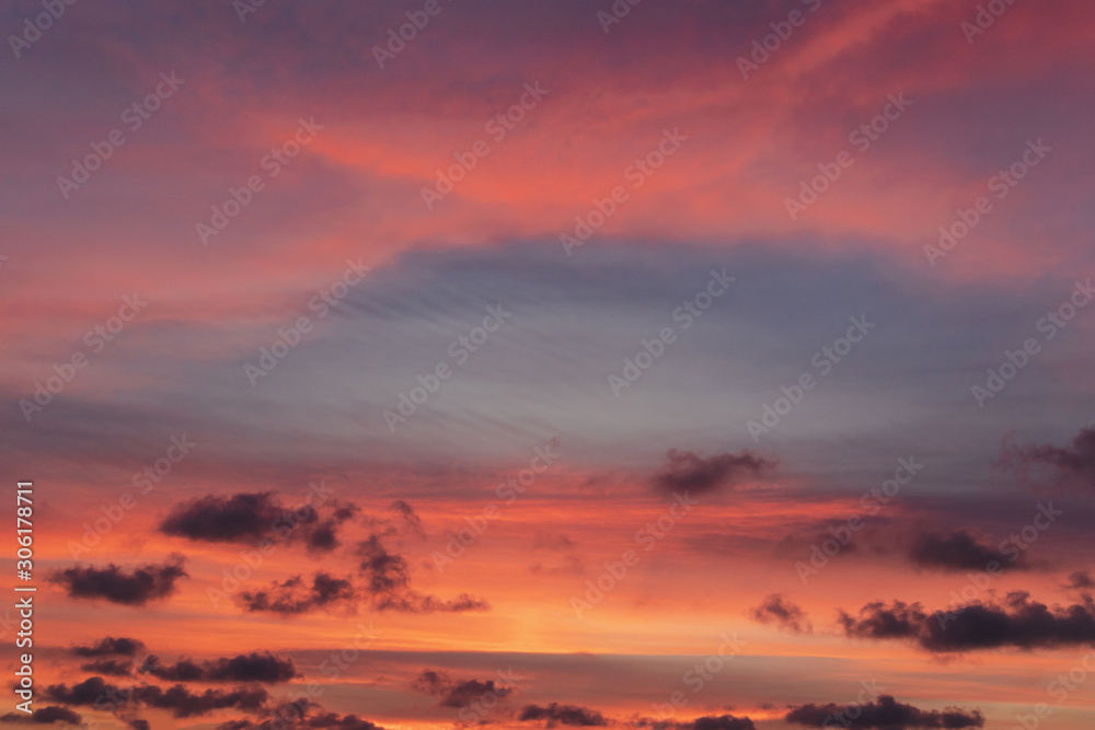 colorful sky at sunset with some clouds