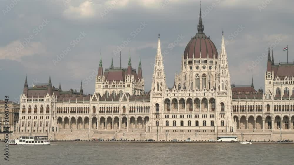 daytime close up of the hungarian parliament and river danube in budapest, hungary daytime close up of the hungarian parliament and river danube in budapest, hungary