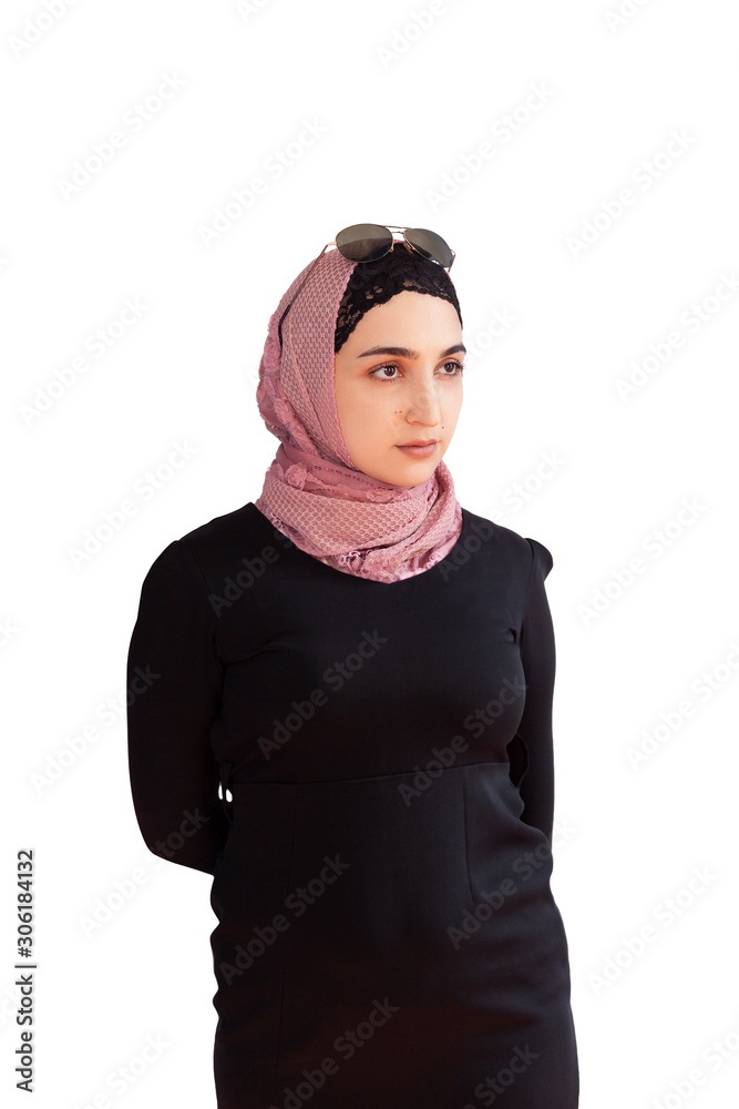 Stylish muslim woman in traditional Islamic clothing. Portrait of beautiful middle-eastern girl in Hijab. Stock photo of Islamic clothing, fashion.