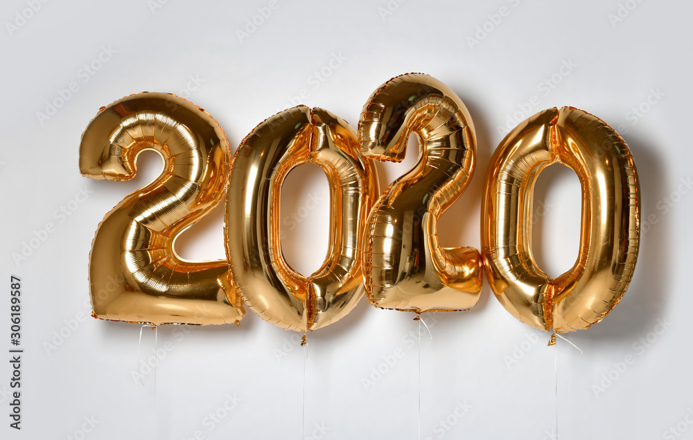 New year and christmas 2020 celebration concept. Gold foil balloons numeral 2020 New year and christmas 2020 celebration concept. Gold foil balloons numeral 2020