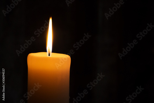 Candle Burning in the Dark. Spiritual and Religious Concept