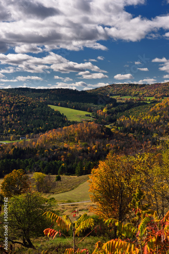 Valley at Barnet Center Vermont with hills touched by Fall colors