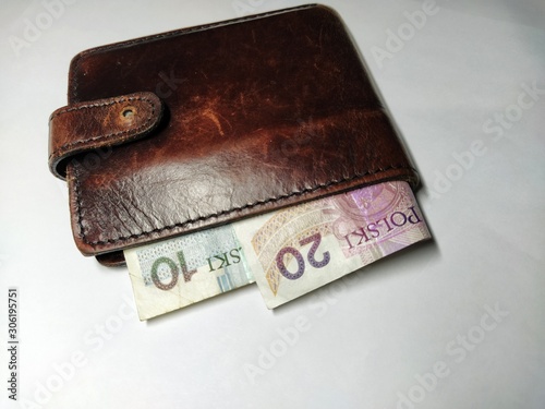 wallet with money isolated on white background