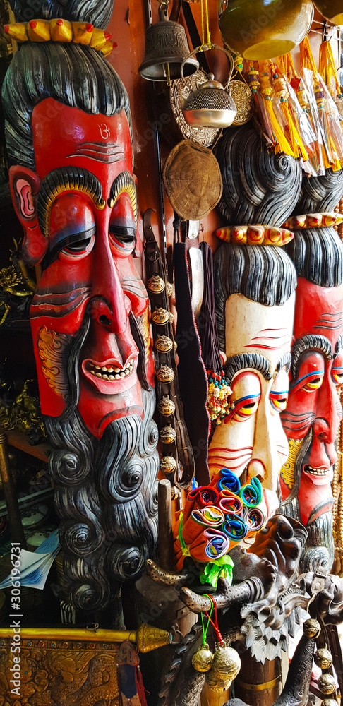 Souvenirs of traditional tibetan wooden masks in Lhasa, Tibet - China.