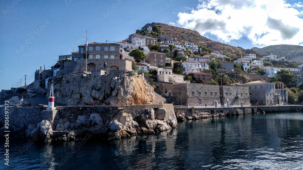 Houses on rocks near harbour in Hydra, Greek Islands