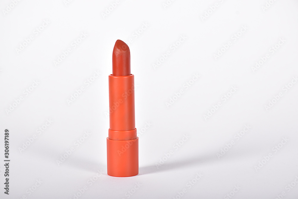 on white background isolated red lipstick, girl product for make up on white background isolated red lipstick, girl product for make up
