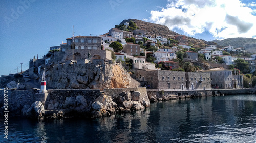 Houses on rocks near harbour in Hydra, Greek Islands