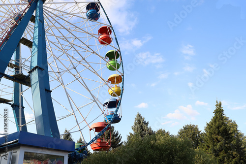 Attraction Ferris wheel in the summer Park