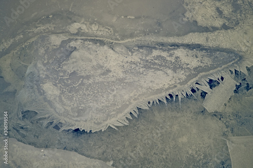 ice surface with winter patterns blue-white, skating, skiing, new year