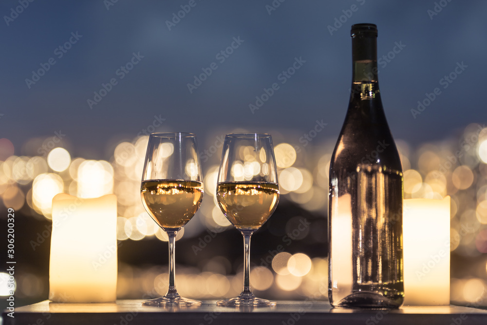Wine glasses on bar and city view. Wine glasses on bar and city view.
