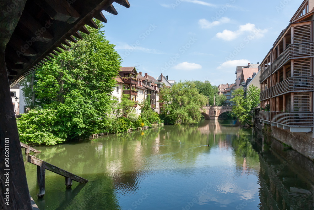 view of the river and residential buildings in the old town of Nuremberg