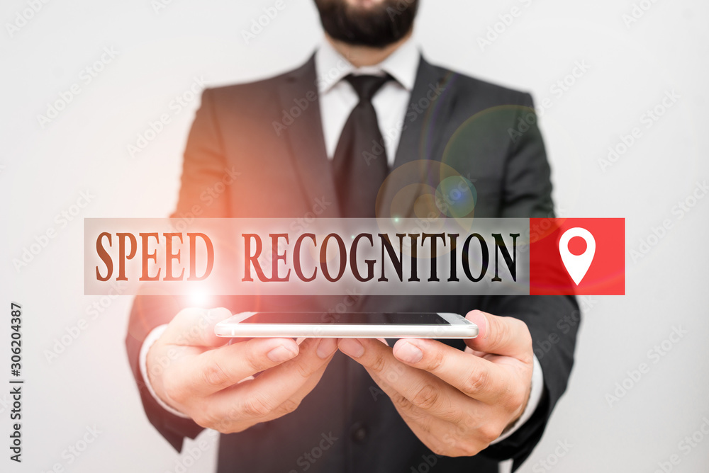 Conceptual hand writing showing Speed Recognition. Concept meaning technology used to detect and recognize over speeding car Male human wear formal work suit hold smartphone using hand Conceptual hand writing showing Speed Recognition. Concept meaning technology used to detect and recognize over speeding car Male human wear formal work suit hold smartphone using hand