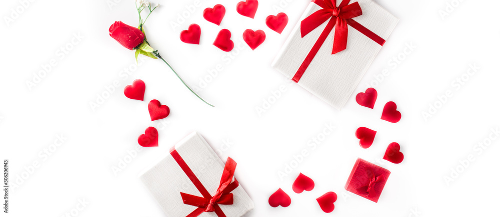 Valentine's Day background with heart, gift boxes and rose on white background. Panorama view