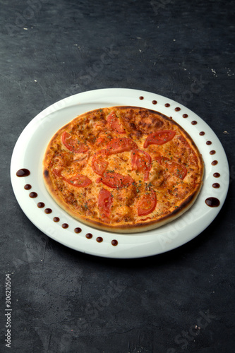 crispy pizza with cheese and tomato