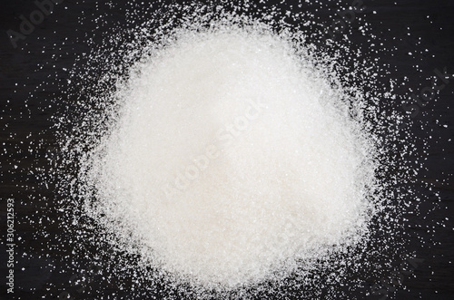 white sugar on a black background