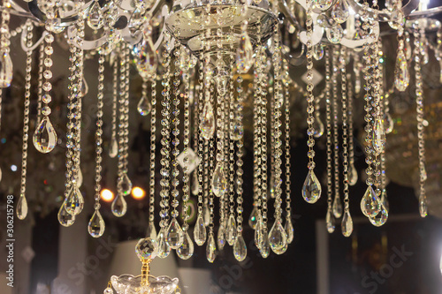 crystal chandelier with hanging jewelry diamonds. luxury interior