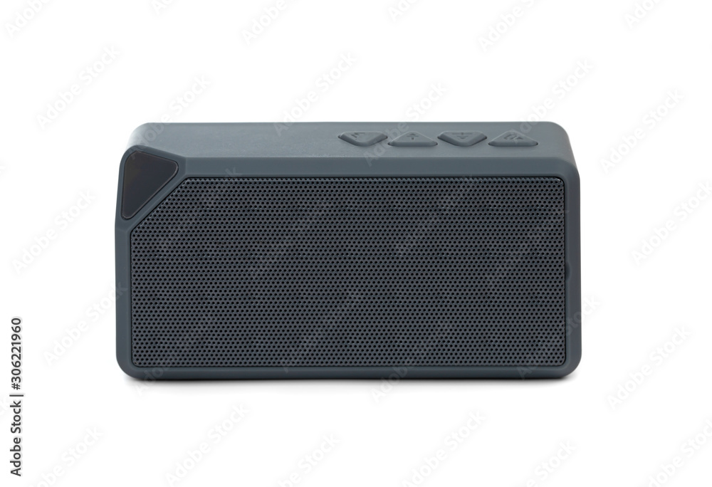 Wireless speaker on a white background. Rectangular music speaker close-up. Wireless speaker on a white background. Rectangular music speaker close-up.