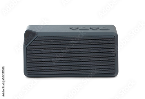 Wireless speaker on a white background. Rectangular music speaker close-up.