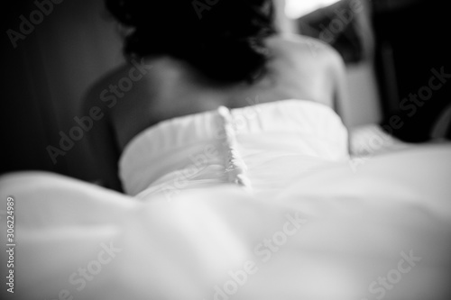 Back and dress of a bride woman on her wedding day. © Joaquin Corbalan