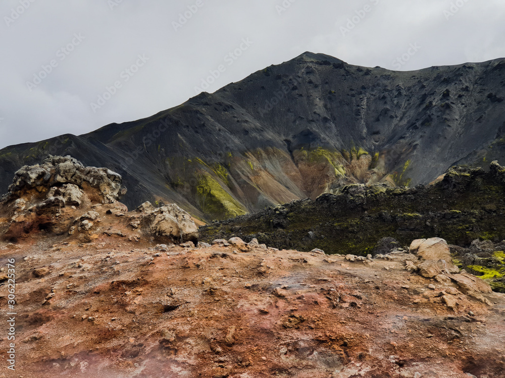 Black and red rocks in lava mountains in Iceland 