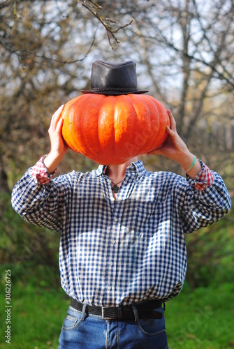 man with pumpkin