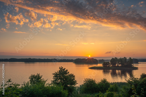 Sunrise over the Soltmany lake near Kruklanki, Masuria, Poland © Artur Bociarski