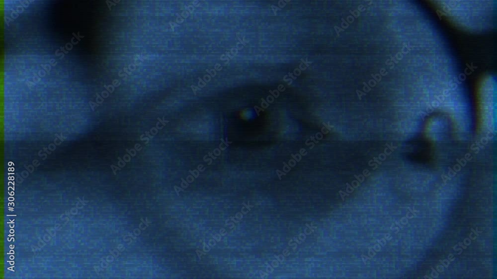 Bad transmission signal effect over Close-up of young women eyes surfing the internet on tablet smartphone device with screen being reflected in her eyewear glasses addiction to social networks 
