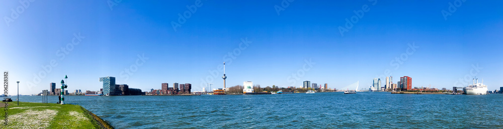 panoramic picture of rotterdam skyline at the port, blue sky panoramic picture of rotterdam skyline at the port, blue sky