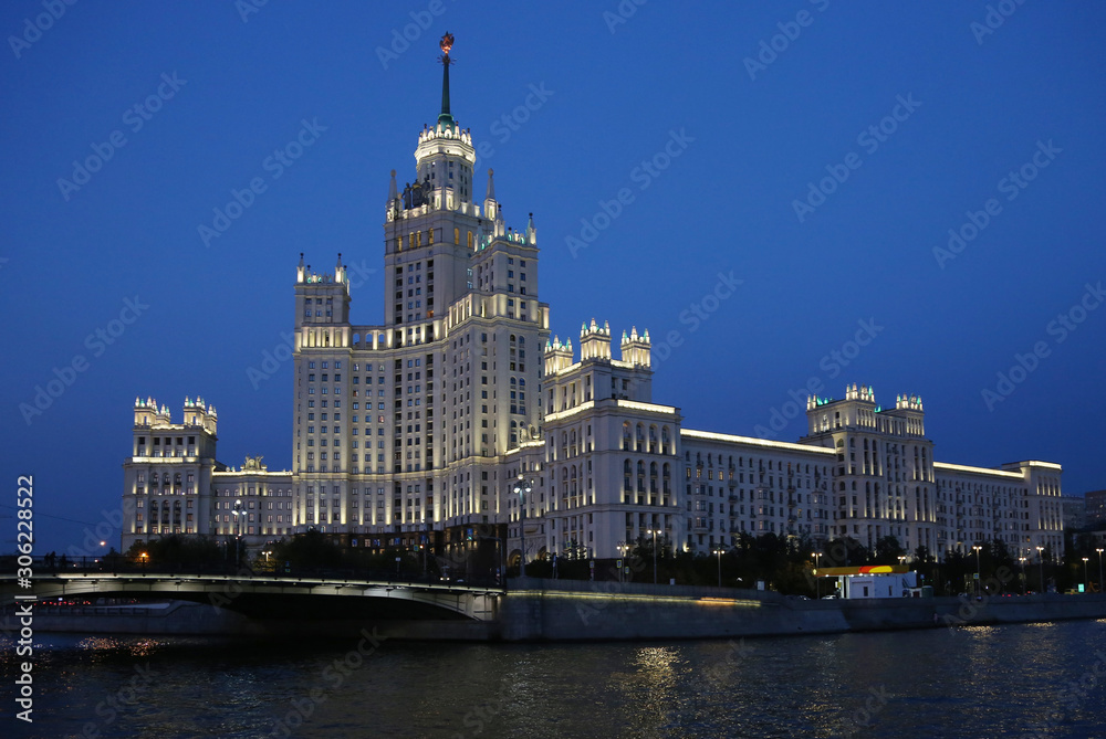 Moscow. High-rise building on Kotelnicheskaya embankment. Night view from the Moscow river