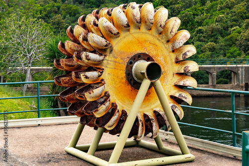 Technique, Sardinia, Italy - A very old turbine wheel for electricity generation at lake Sao Teula. photo