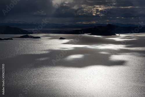 Sunset on Lake Titicaca. View from the Pachatata peak. Peru photo