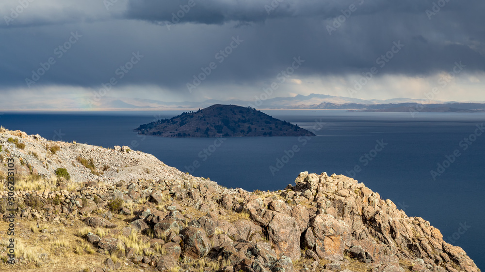 Sunset on Lake Titicaca. View from the Pachatata peak. Peru