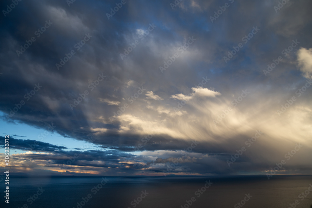 Sunset on Lake Titicaca. View from the Pachatata peak. Peru