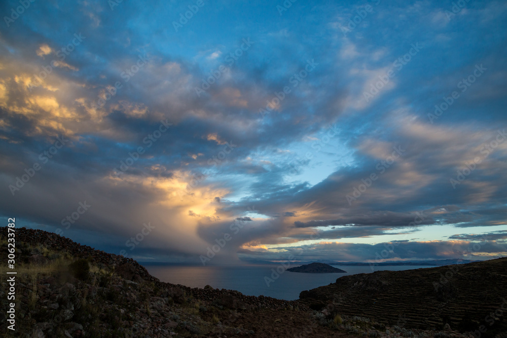 Sunset on Lake Titicaca. View from the Pachatata peak. Peru