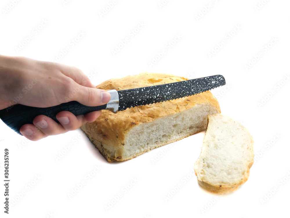 Knife and bread isolated on a white background. Composition of a black knife, pita bread and a slice of bread. Set of ceramic knife and round bread. Sliced slice of pita and knife. Knife and bread isolated on a white background. Composition of a black knife, pita bread and a slice of bread. Set of ceramic knife and round bread. Sliced slice of pita and knife.