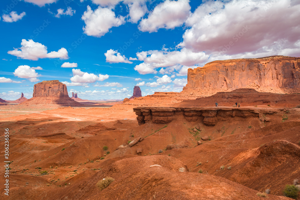 Famous red rocks of Monument Valley. John's Ford Point. Navajo Tribal Park landscape, Utah/Arizona, USA Famous red rocks of Monument Valley. John's Ford Point. Navajo Tribal Park landscape, Utah/Arizona, USA