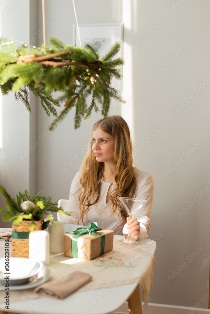 Beautiful woman at the New Year's table. Woman portrait. Beautiful woman at the New Year's table. Woman portrait.