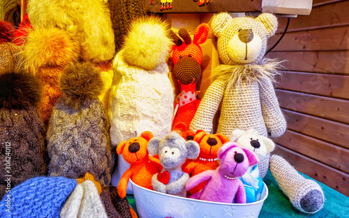 Christmas Handmade Animal Toys Decorations on Christmas Market at Riga, Latvia. Advent Fair, and Stalls with Crafts Items in Bazaar. Night street Xmas and holiday fair in European city town, December