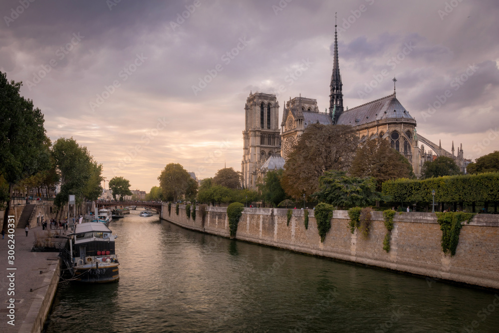 Seine and romantic cathedral Notre Dame at the sunset, Paris, France