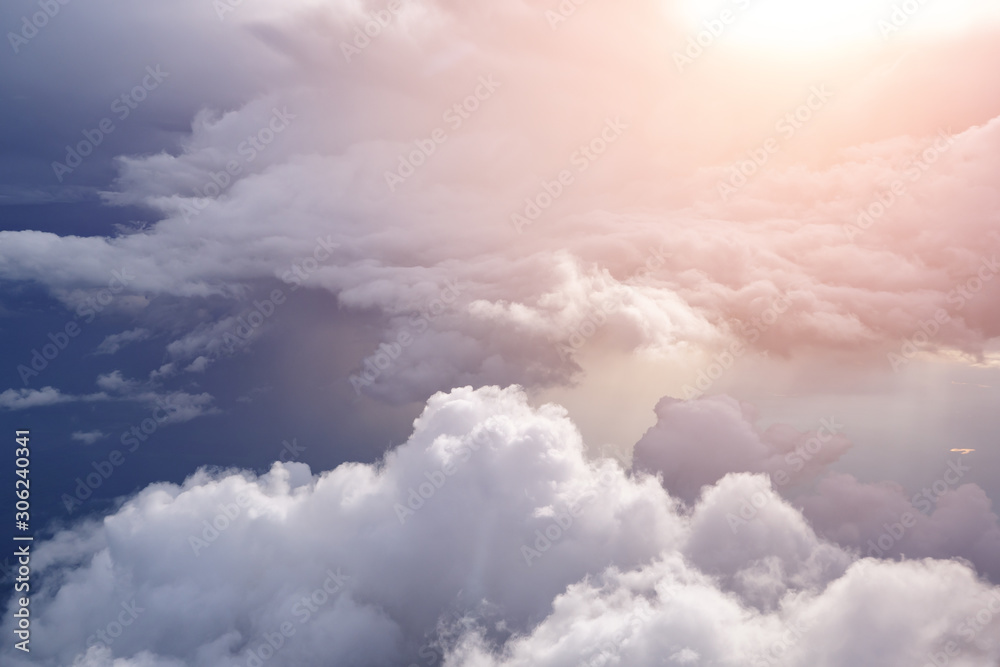 Φωτογραφία Aerial view from the plane of white soft fluffy clouds over the green landscape in sky in sunny day